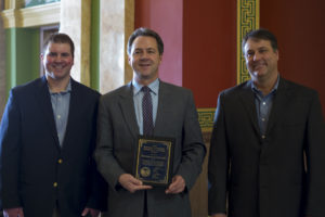 Governor Steve Bullock presenting the Exporter of the Year award in the Montana Capitol.